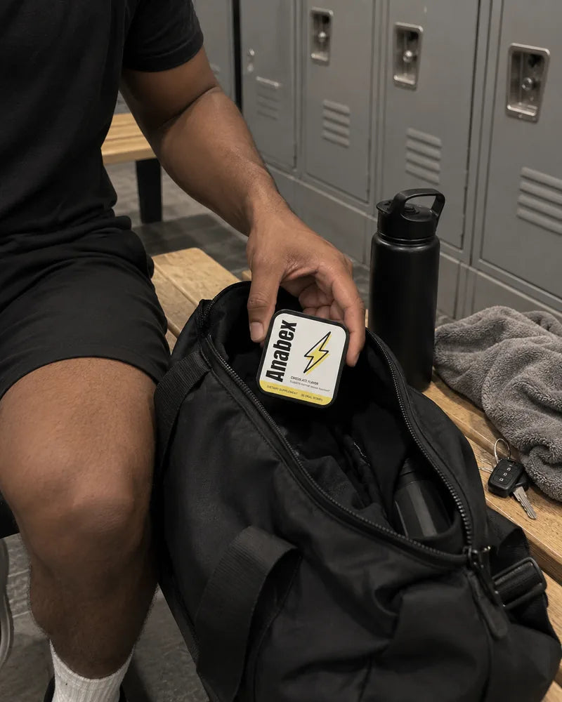 Man putting an Anabex tin into his gym bag