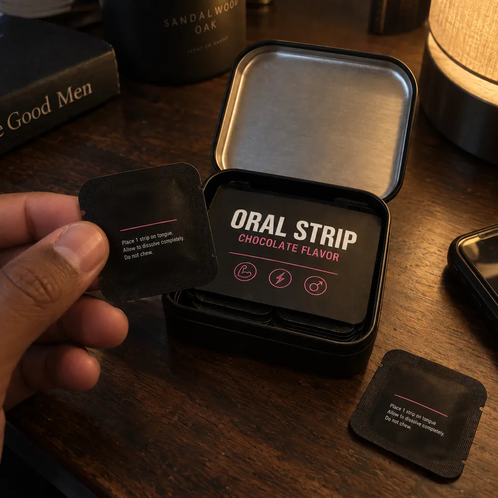 An individually wrapped Anabex strip held next to an open black tin